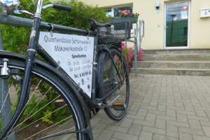 Quartiersbüro mit Rad, Foto Quartiersbüro © Quartiersbüro Quartiersbüro Schönwalde II